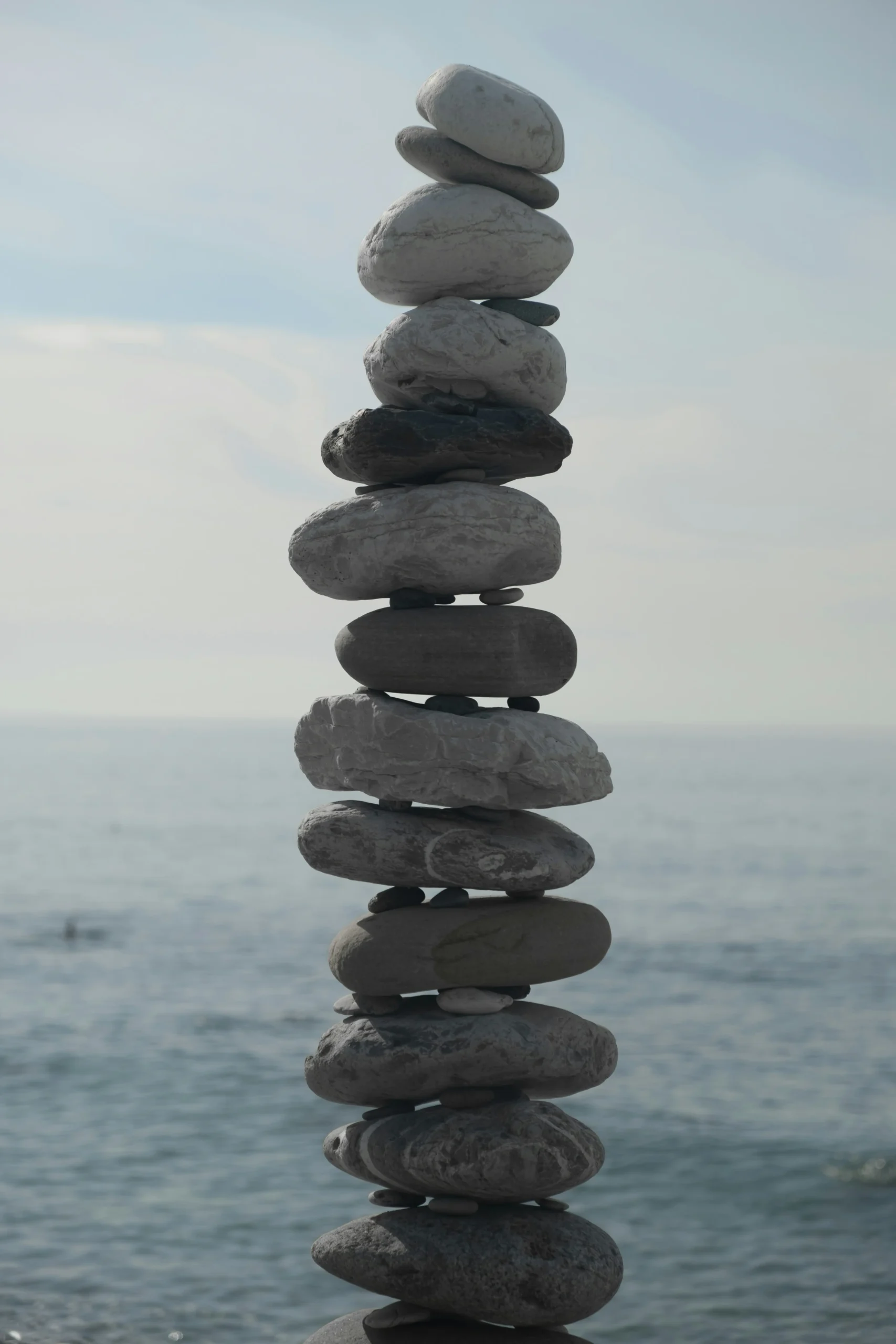 A stack of balanced stones symbolizing homeostasis and the path to sustainable wellness by balancing the human endocannabinoid system.