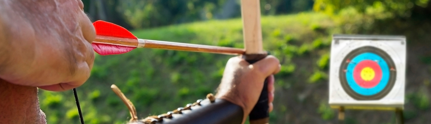 Archer drawing a bow with steady focus, representing Focus and Flow and sustained mental precision